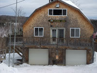 outdoorsman lodging, patten me - picture of outside of cabin two