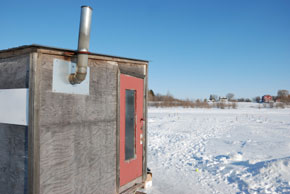  outdoorsman lodging- patten, me- photo of ice fishing cabin on a lake 